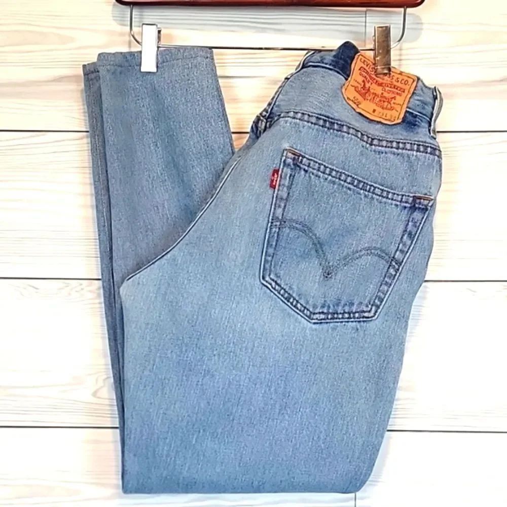Levi's 550 vintage red tab stonewashed tapered leg blue denim jeans Women's 28
